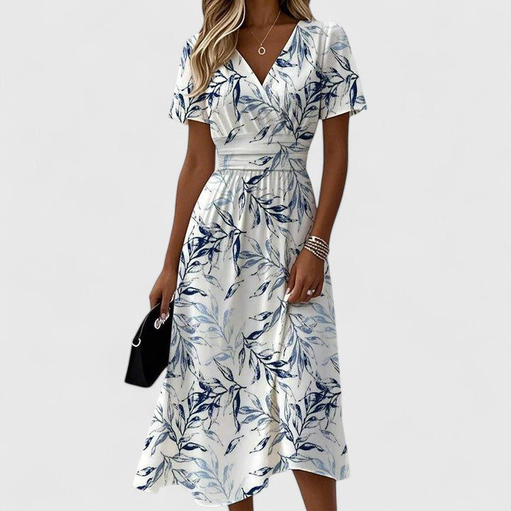 Flora | Abito midi da donna con stampa floreale, scollo a V incrociato e maniche svolazzanti