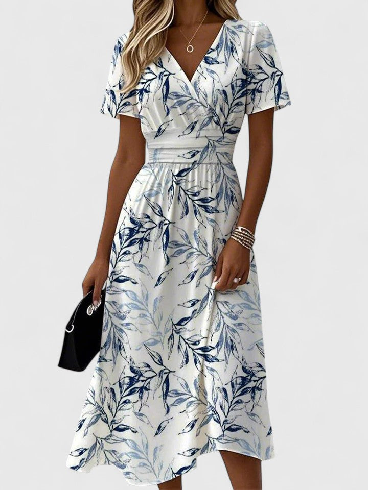 Flora | Abito midi da donna con stampa floreale, scollo a V incrociato e maniche svolazzanti