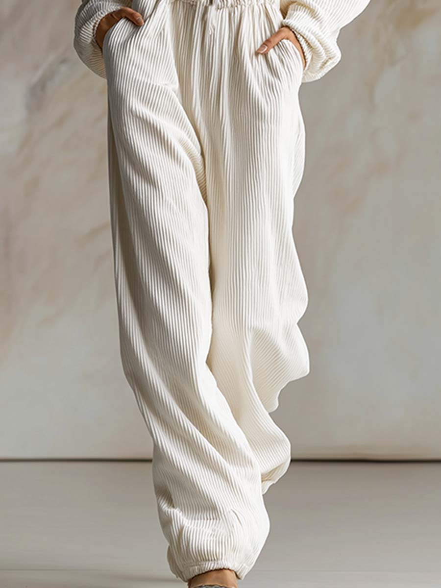 Mono casual holgado de pana blanca con capucha, cremallera frontal y manga larga, a la moda