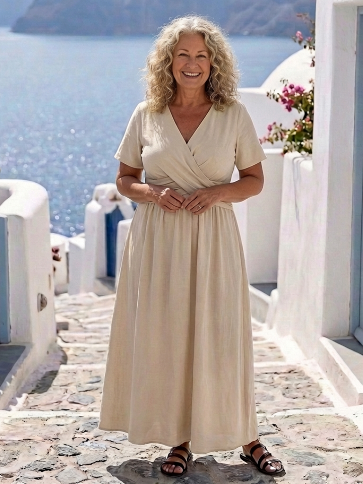 Alvara | Vestido midi cruzado con escote en V, manga corta y cintura ajustada