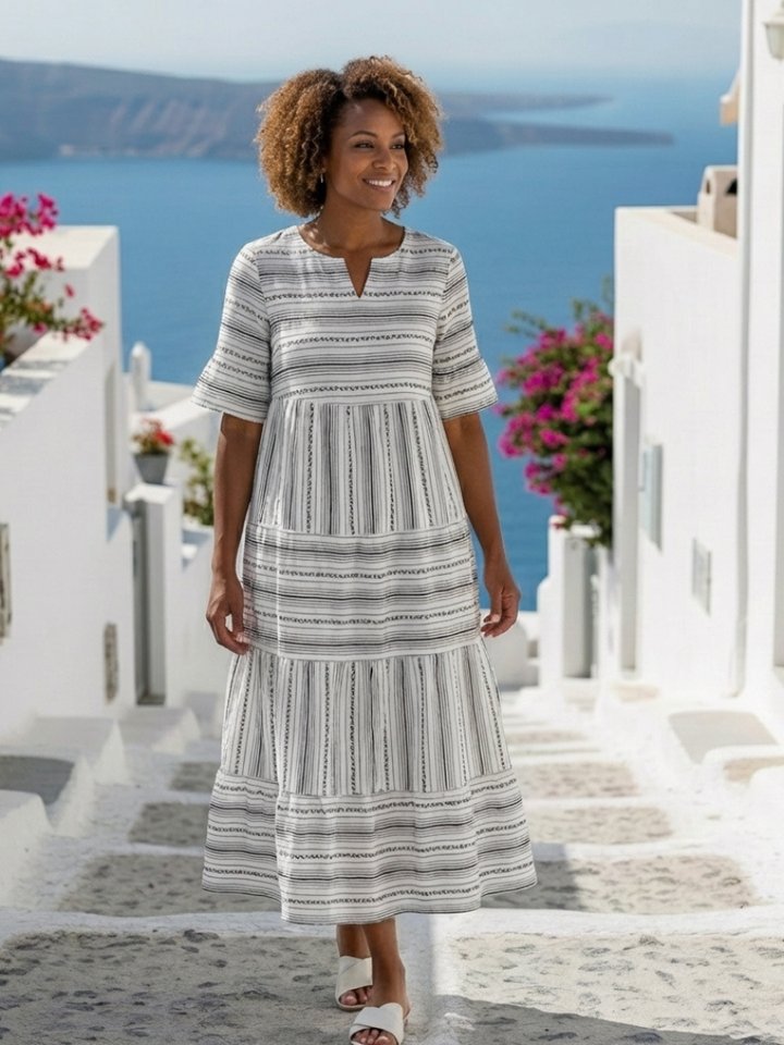 Parisa | Vestido midi a rayas con volantes y mangas cortas