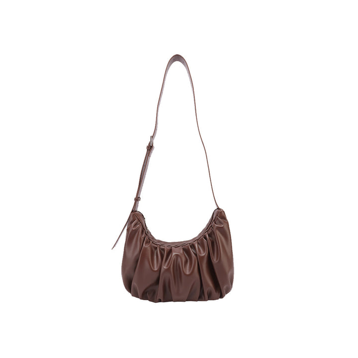 Chara | Sac bandoulière en cuir en forme de croissant