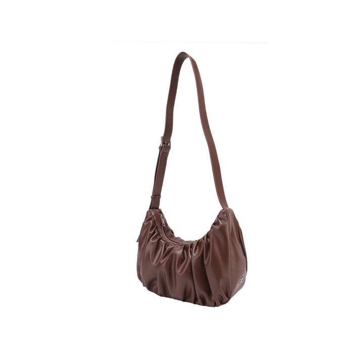 Chara | Sac bandoulière en cuir en forme de croissant