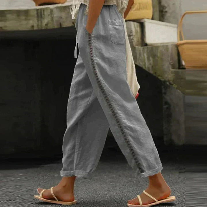 Abby | Pantalones de mujer de cintura alta con pierna estrecha y raya lateral