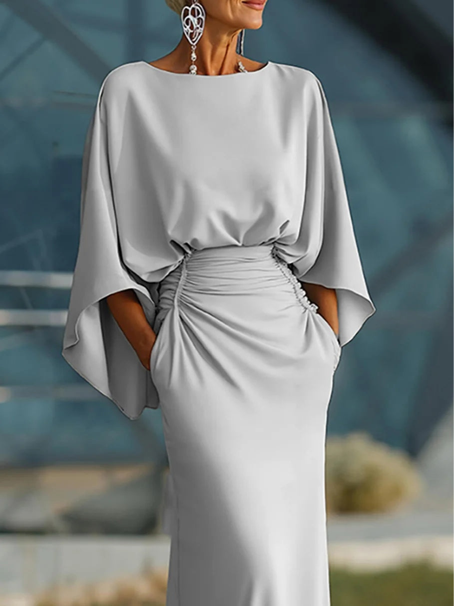 Clara | Elegante abito con scollo a V, schiena scoperta e maniche