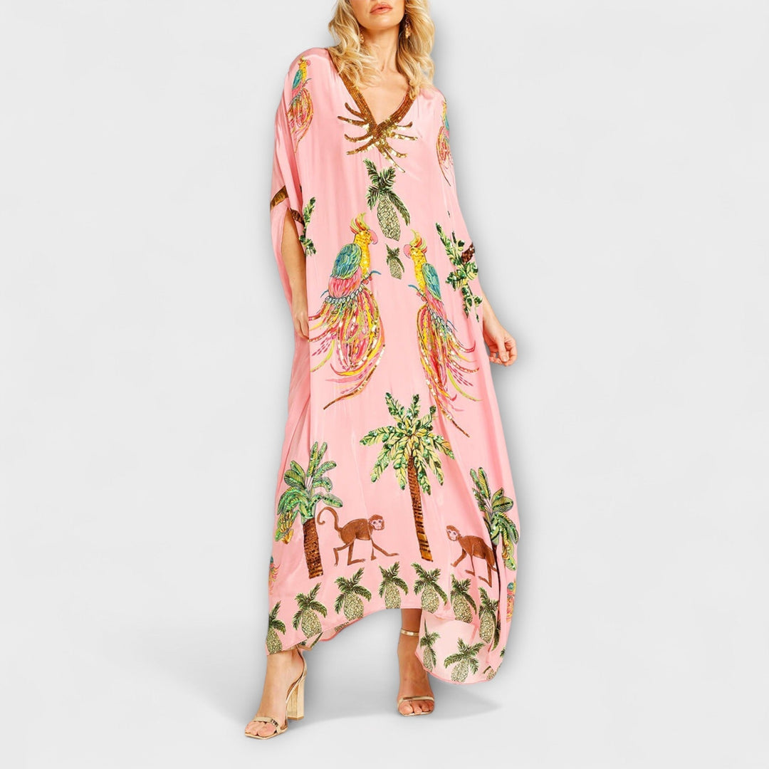 Linda - Vestido llamativo con hombros asimétricos y estampado de palmeras