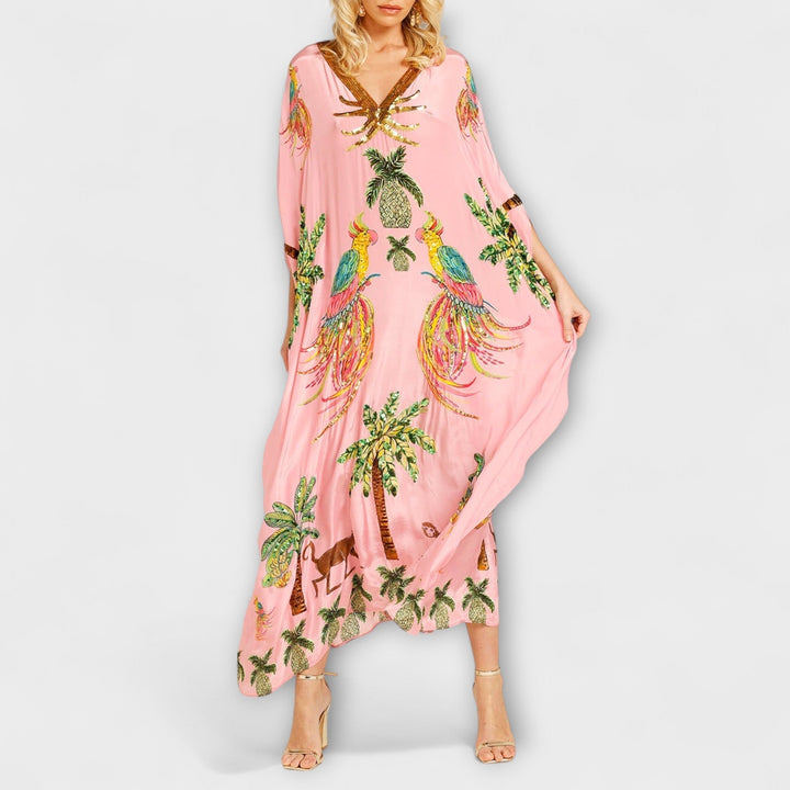 Linda - Vestido llamativo con hombros asimétricos y estampado de palmeras