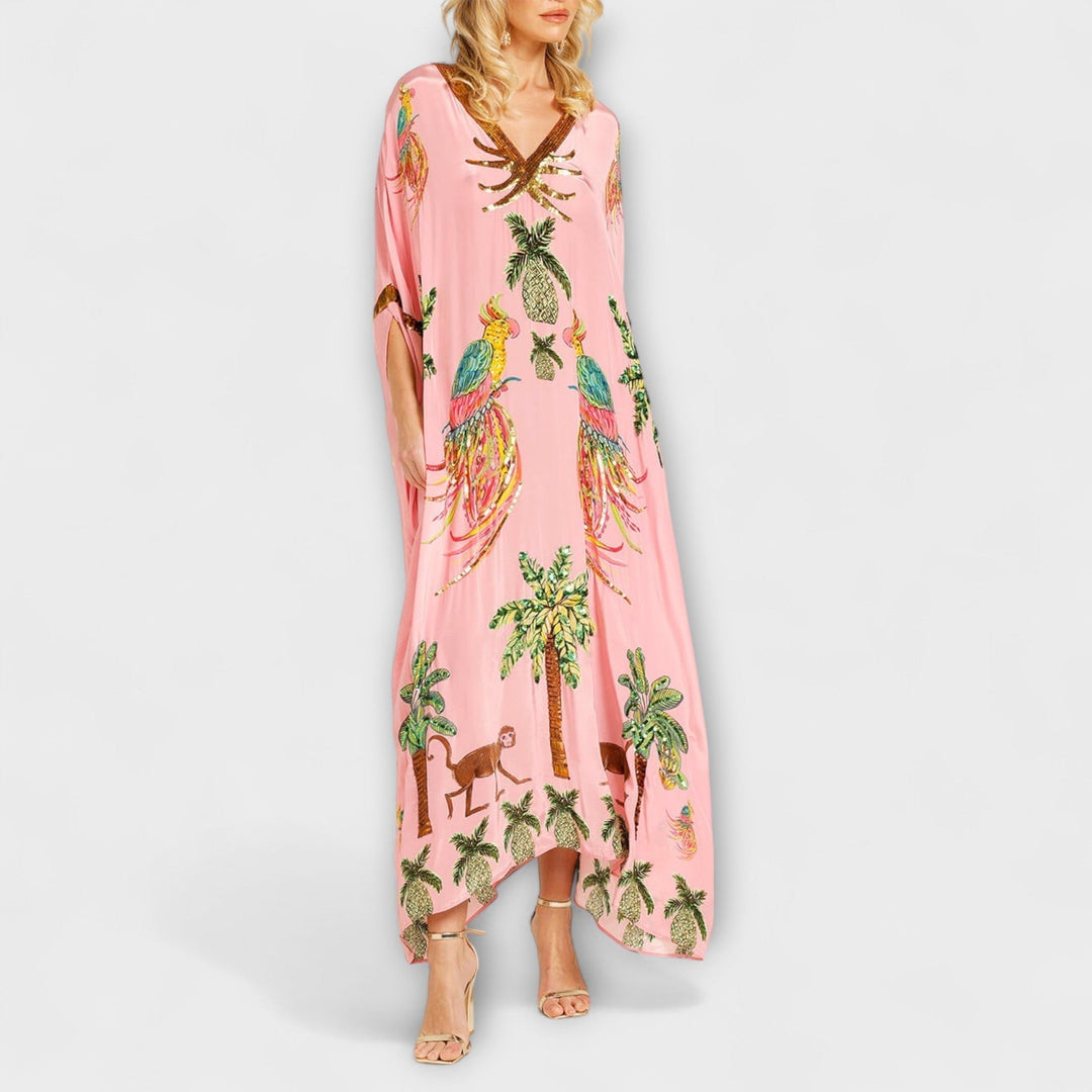 Linda - Vestido llamativo con hombros asimétricos y estampado de palmeras