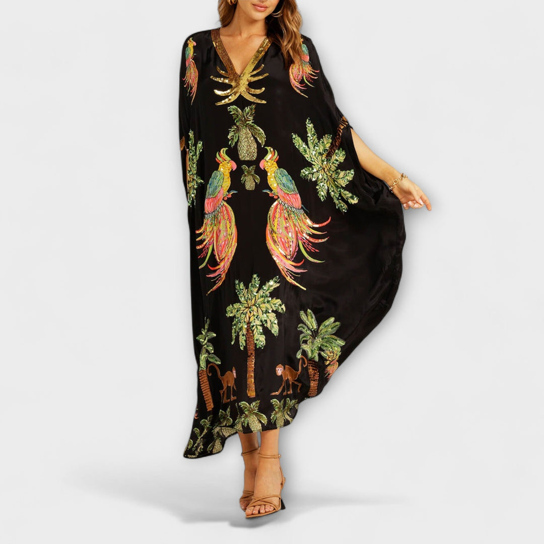 Linda - Vestido llamativo con hombros asimétricos y estampado de palmeras
