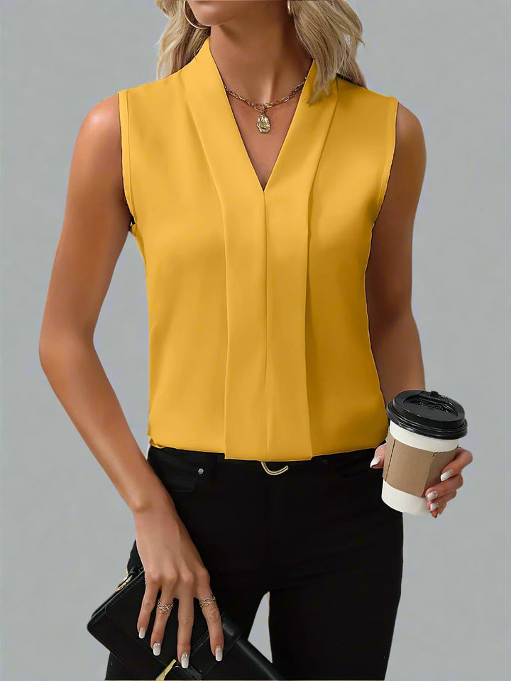 Claire | Blusa para mujer sin mangas con escote en V y frente plisado