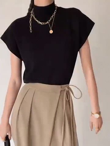 Noira | Top senza maniche da donna con collo alto e spalline imbottite