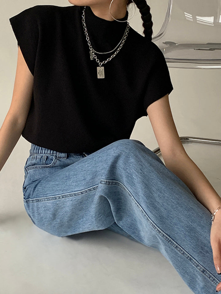 Noira | Top senza maniche da donna con collo alto e spalline imbottite
