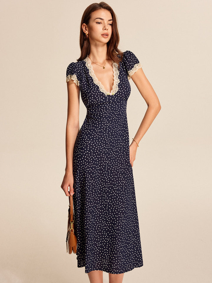 Colette | Vestido midi para mujer con lunares, escote en V, manga corta tipo capa y detalle de encaje