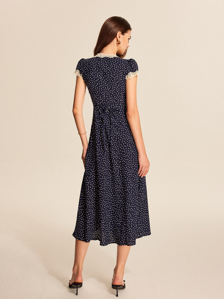 Colette | Vestido midi para mujer con lunares, escote en V, manga corta tipo capa y detalle de encaje