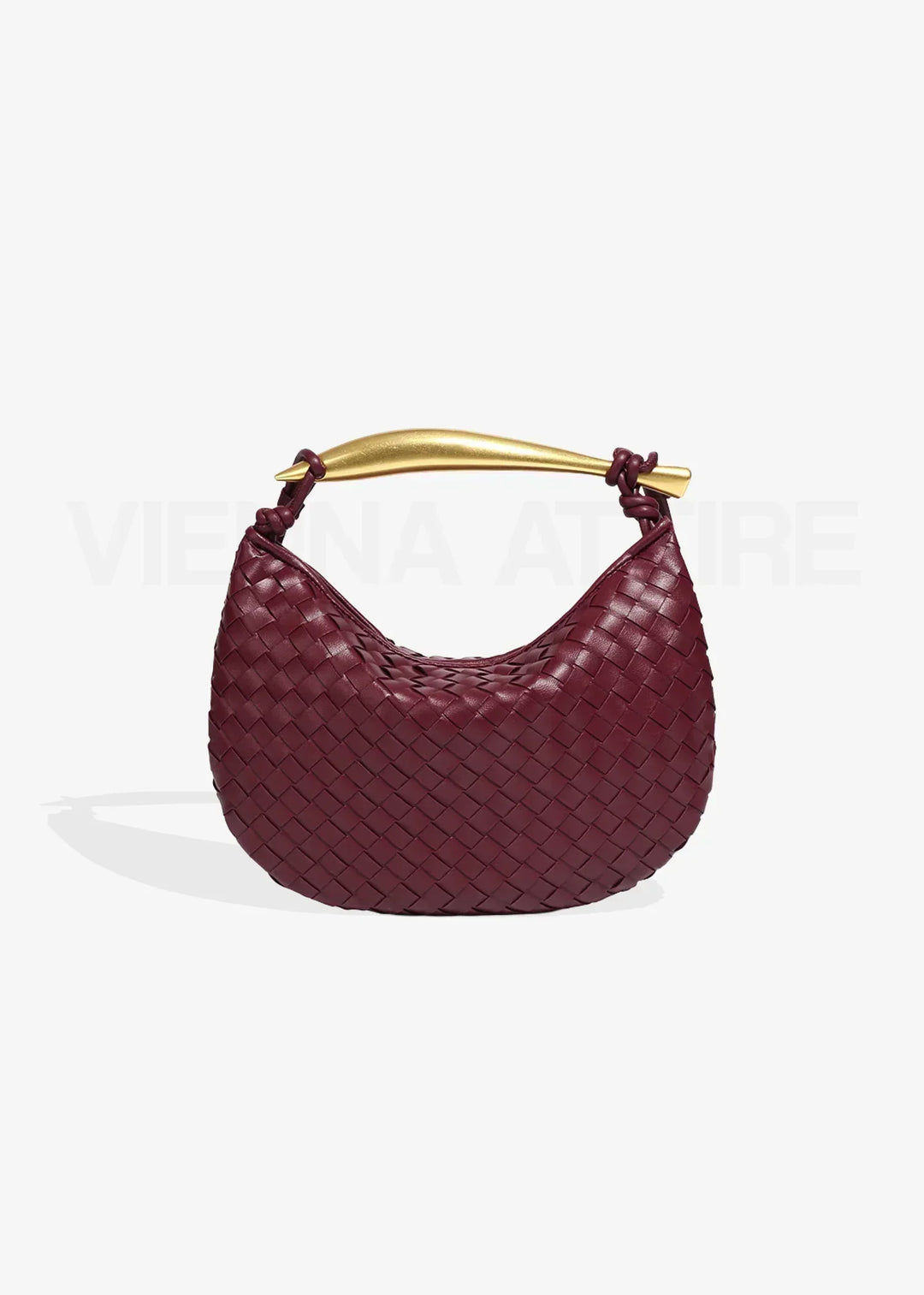 Alexandra – Sac à motif tissé avec poignée dorée